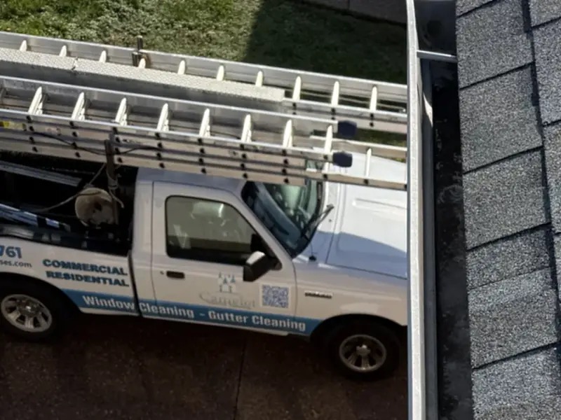 Branded Camelot truck on a gutter job