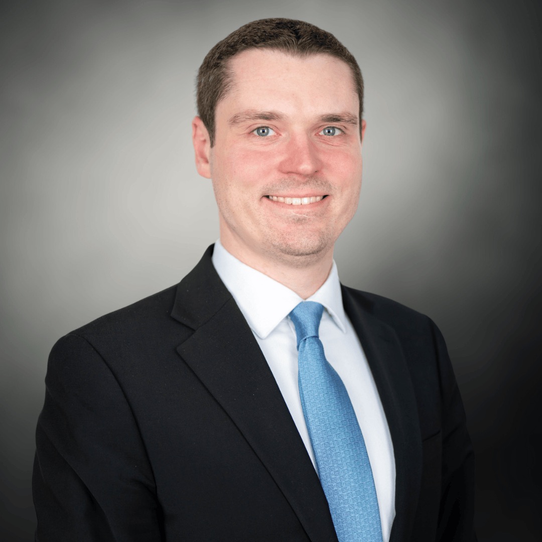 Second image from the firm's 2025 headshot set; verify