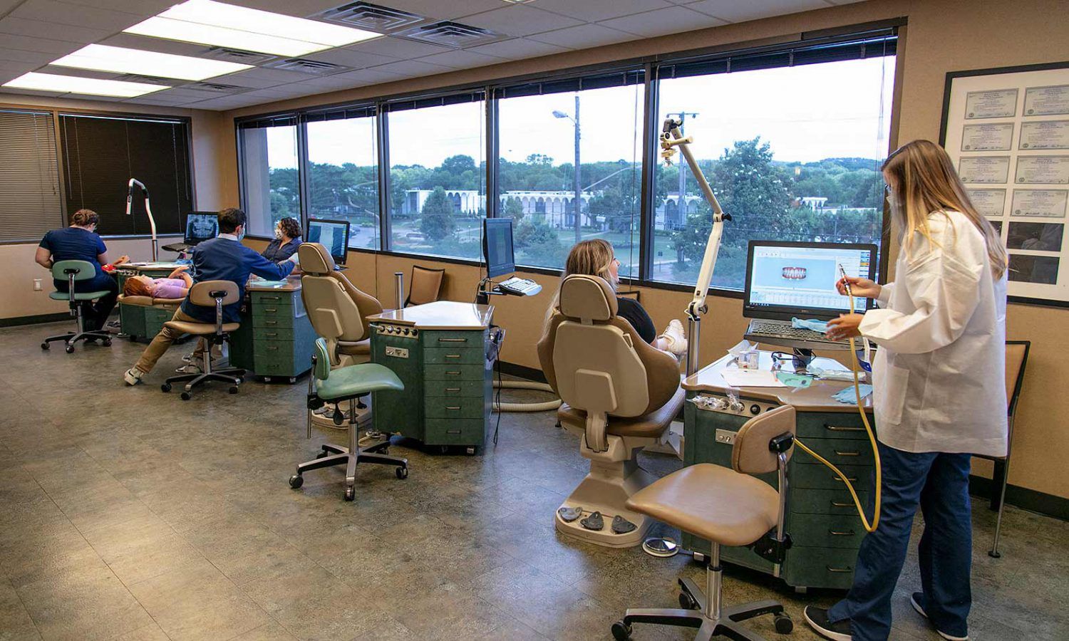 The practice's open treatment bay with windows