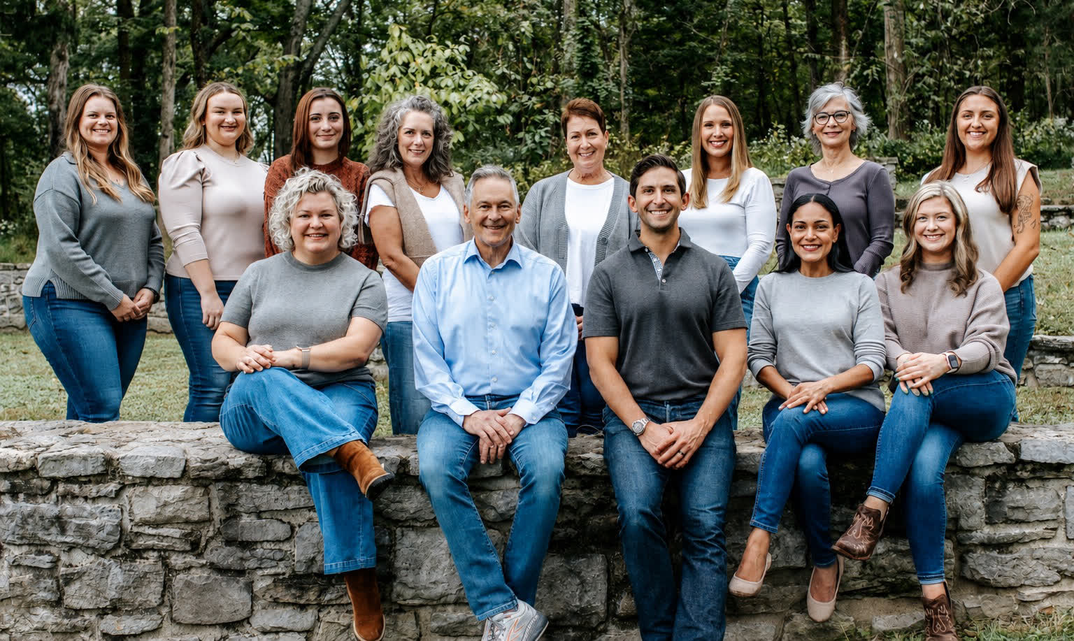 2026 group photo of the Gluck Orthodontics team, including both doctors