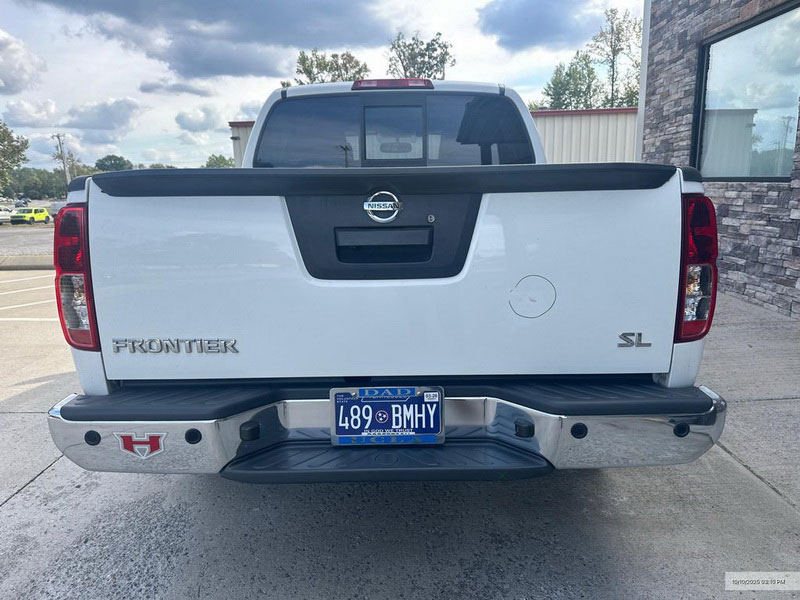 Before-and-after of a Nissan Frontier they repaired.